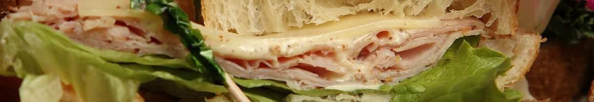 Eating Deli Sandwich at B & L Deli restaurant in Hollywood, FL.